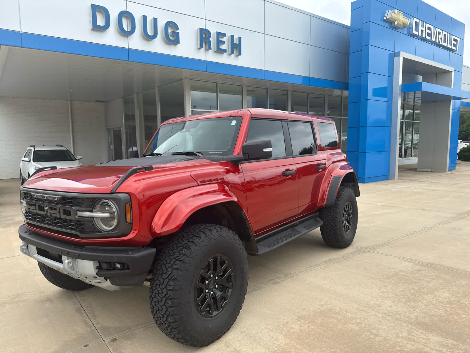 2024 Ford Bronco Raptor in Red — front three-quarter view