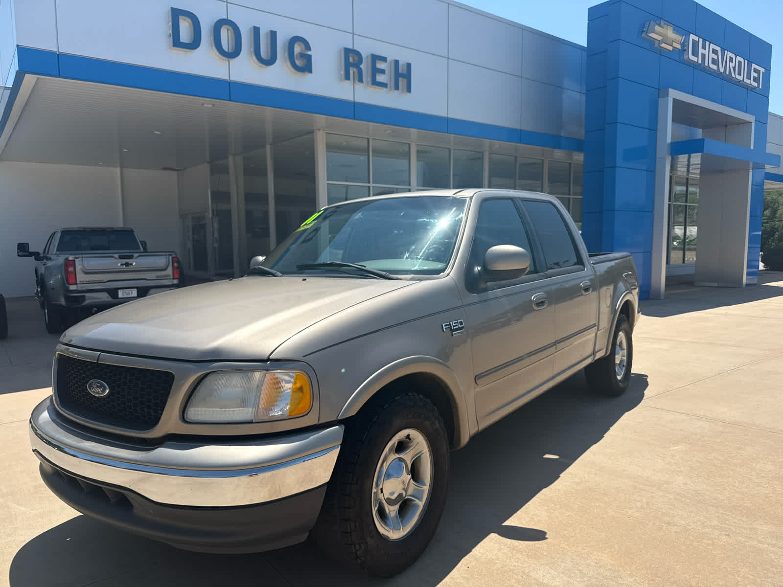 2001 Ford F-150 SuperCrew XLT in Tan — front three-quarter view