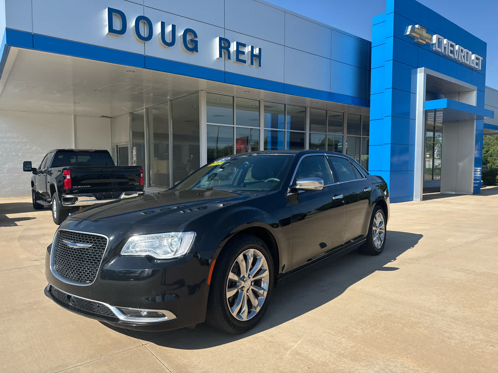 2015 Chrysler 300 300C Platinum in Black — front three-quarter view
